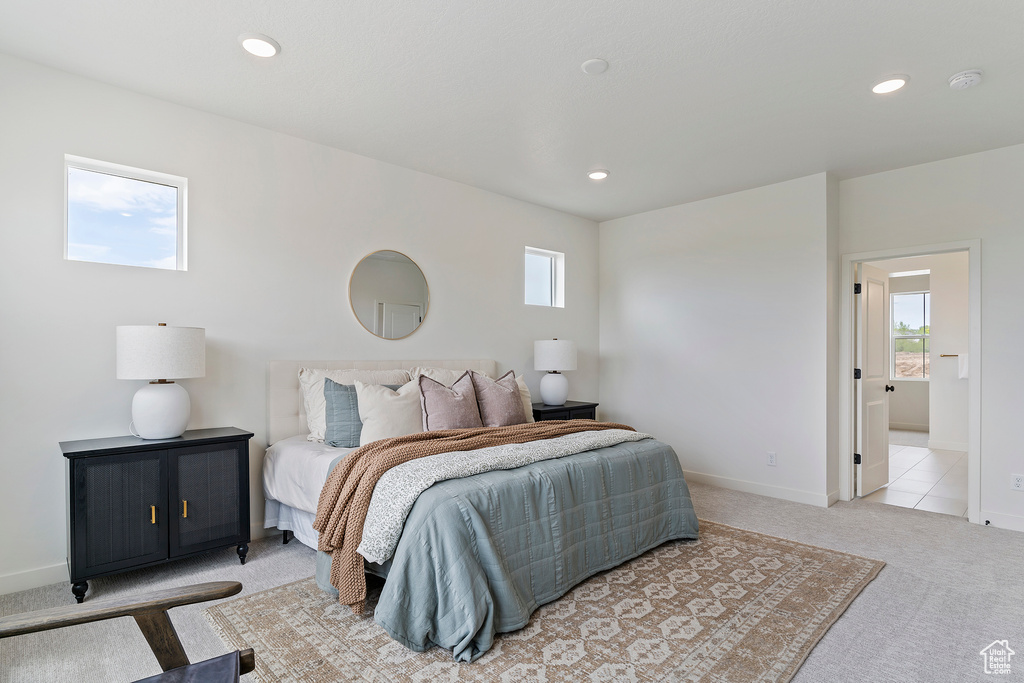 Bedroom with recessed lighting, baseboards, and carpet