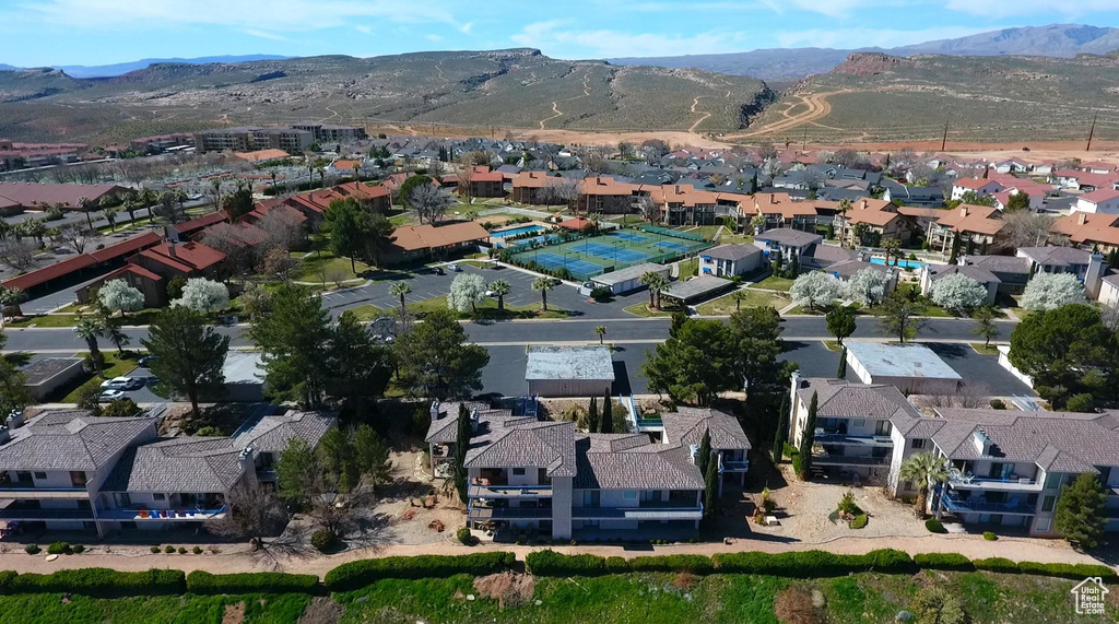 Drone / aerial view with a residential view and a mountain view