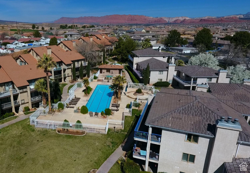 Birds eye view of property featuring a mountain view and a residential view