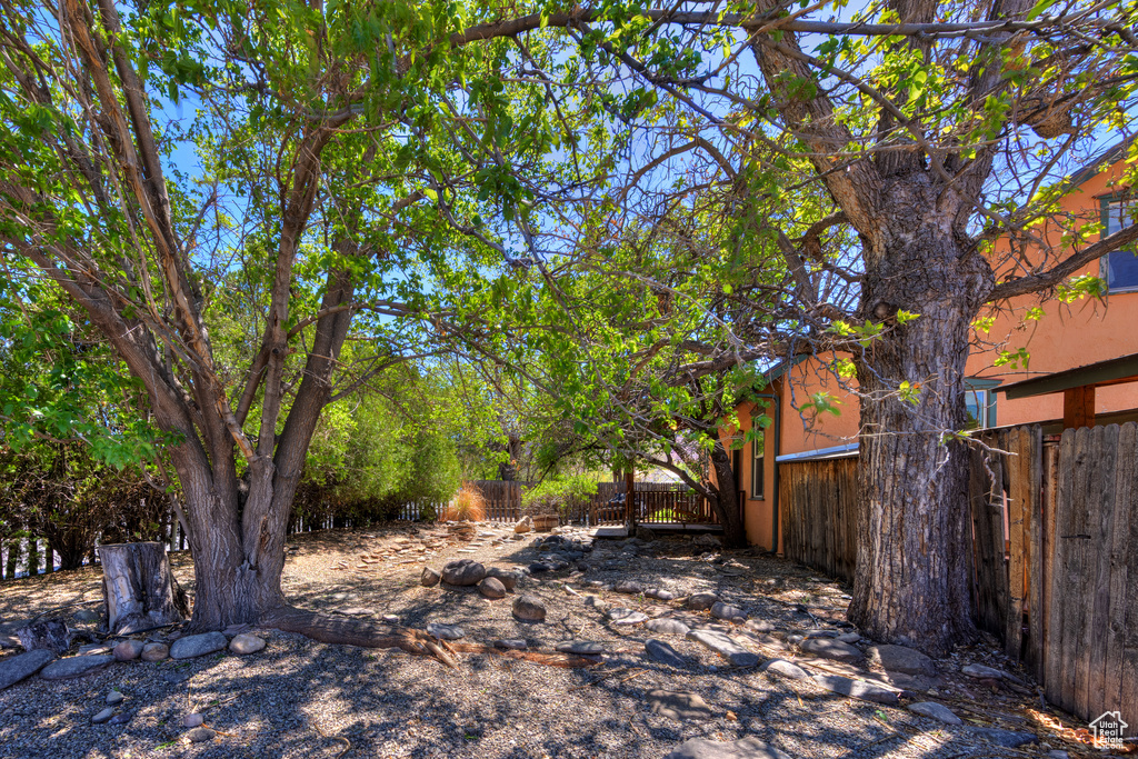 View of yard with fence