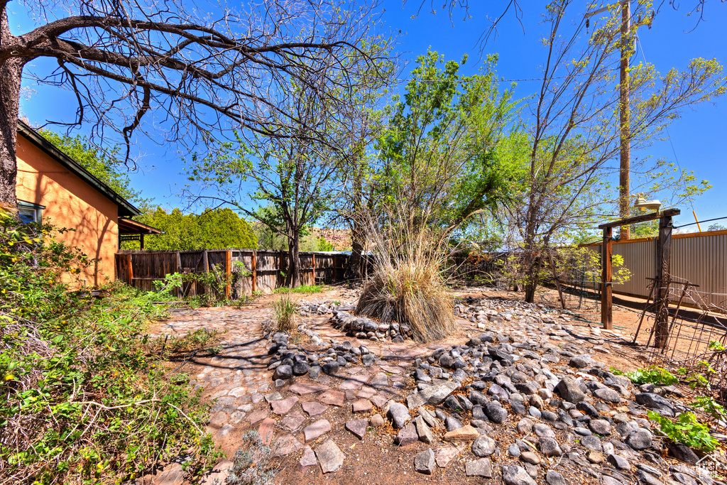 View of fenced backyard