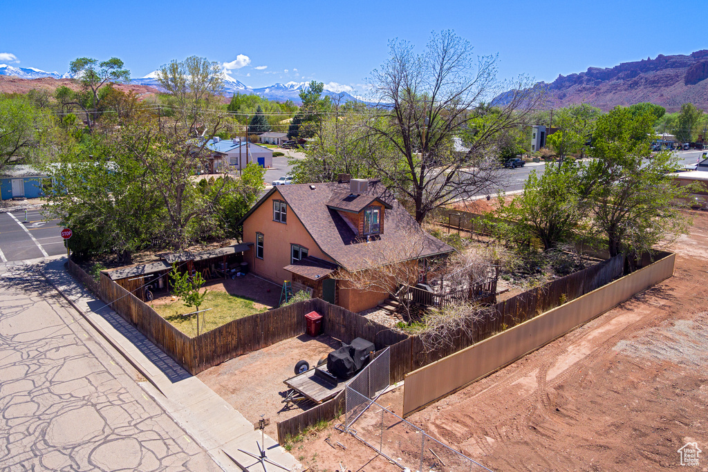 View of subject property with mountains