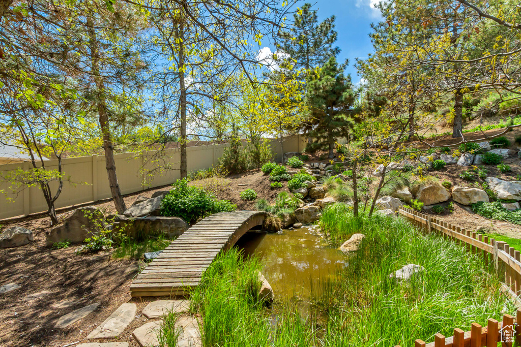 View of yard with a fenced backyard