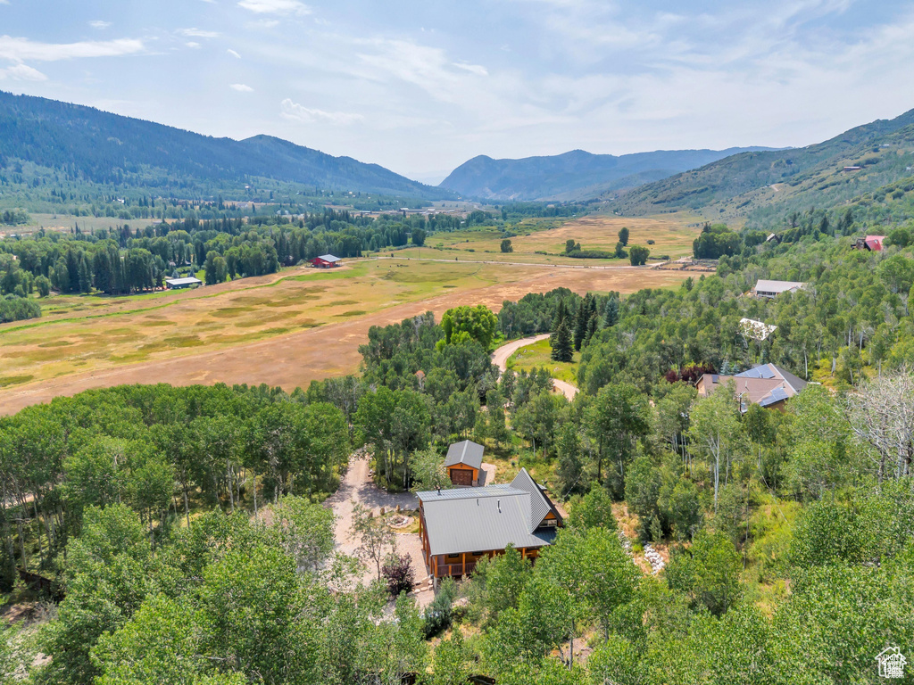 Drone / aerial view with a mountain view and a rural view