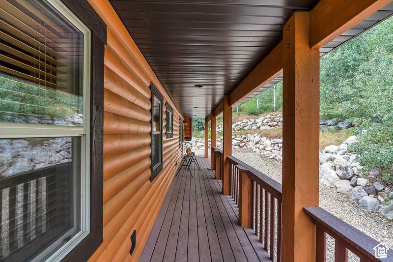 Wooden terrace with covered porch