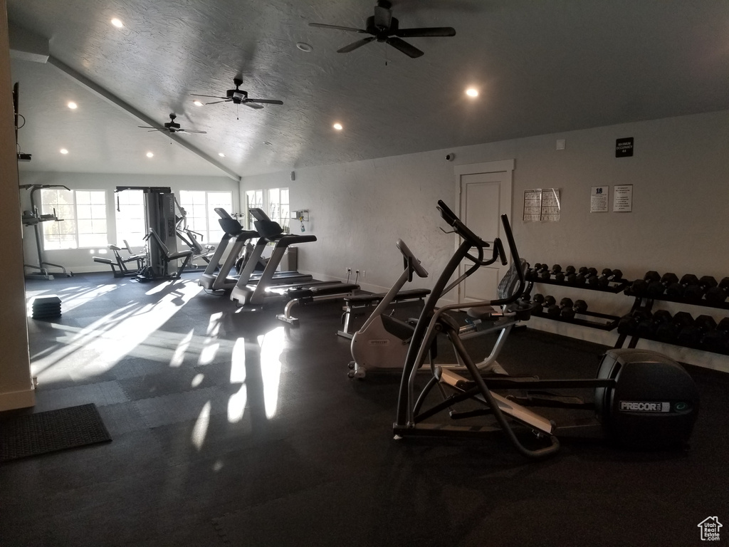 Gym with recessed lighting, vaulted ceiling, and ceiling fan