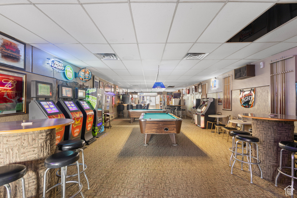 Playroom with visible vents, a drop ceiling, a bar, billiards, and carpet