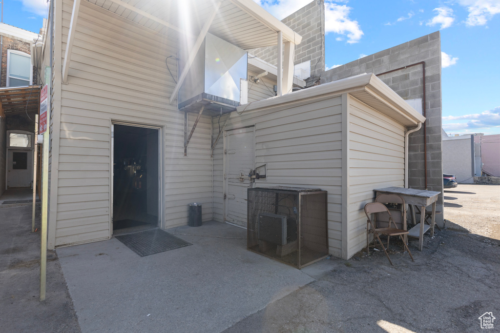 Rear view of house featuring a patio area