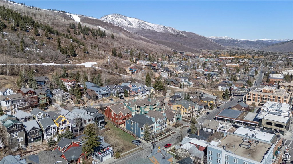 Drone / aerial view with a residential view and a mountain view