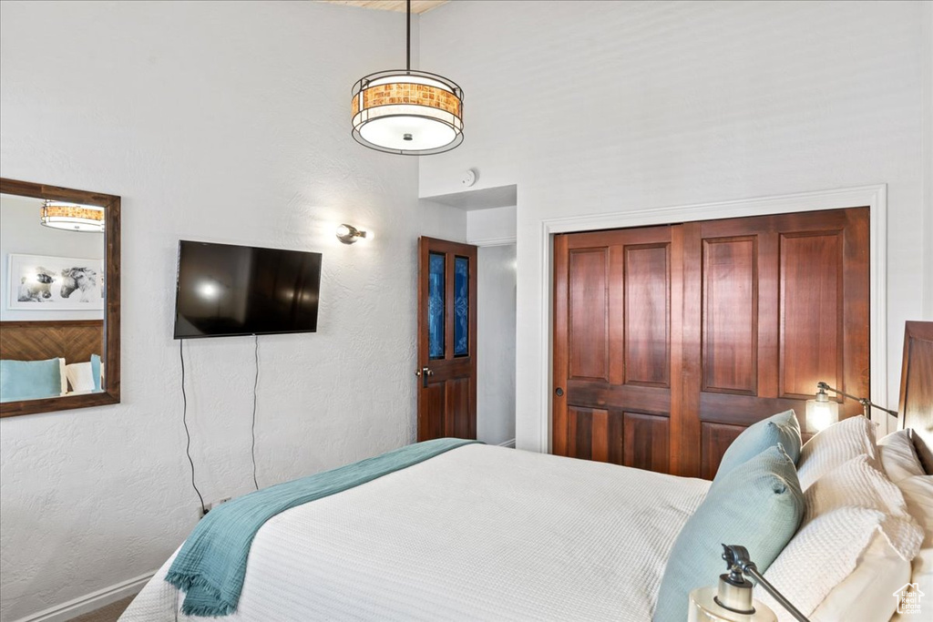 Bedroom featuring a closet and baseboards