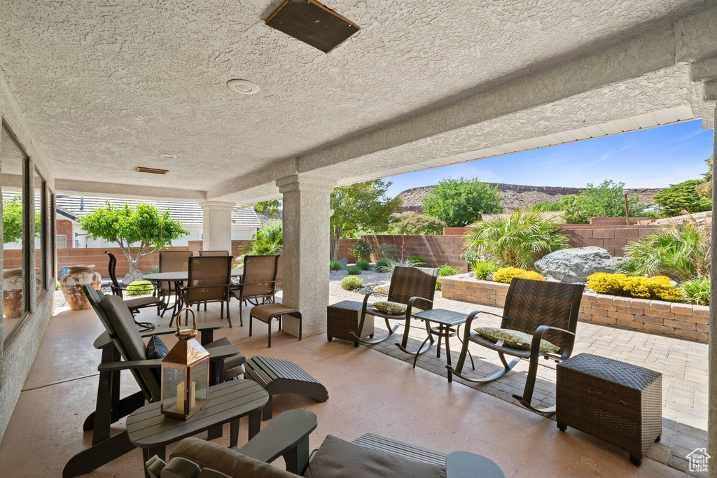 View of patio / terrace featuring outdoor dining space and a fenced backyard