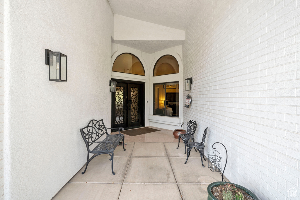 Doorway to property featuring french doors