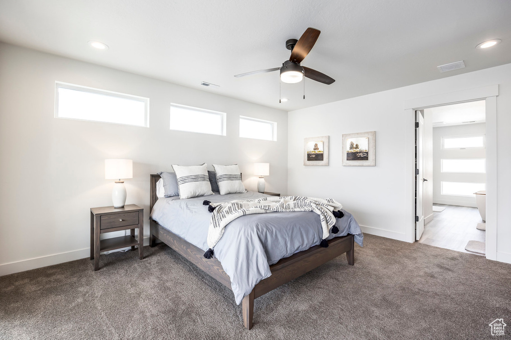 Bedroom featuring carpet floors, recessed lighting, ceiling fan, and visible vents