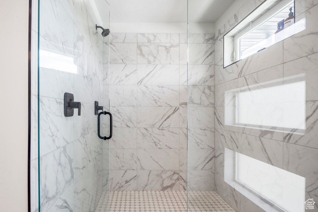 Full bath featuring a stall shower