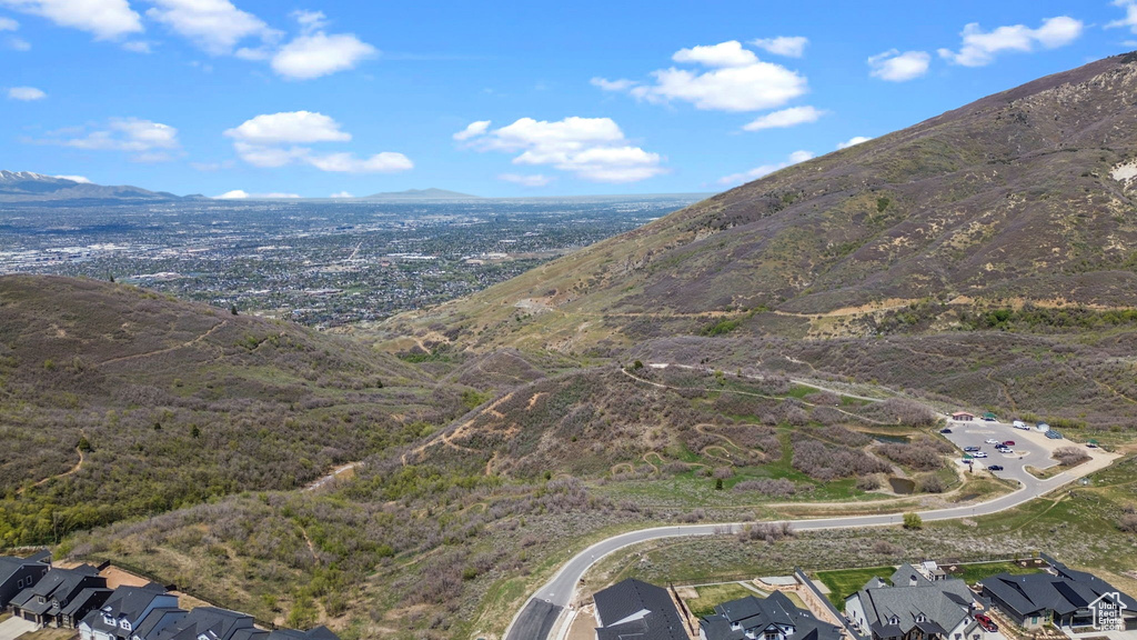 Property view of mountains with a residential view