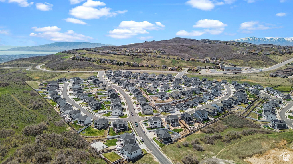 Drone / aerial view featuring a residential view and a mountain view