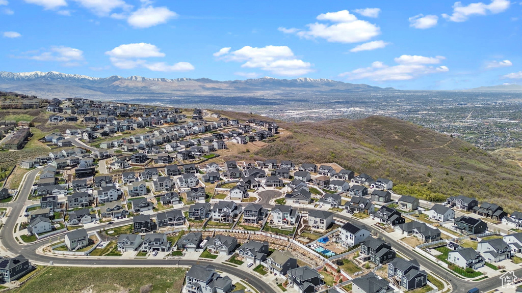 Birds eye view of property featuring a residential view and a mountain view