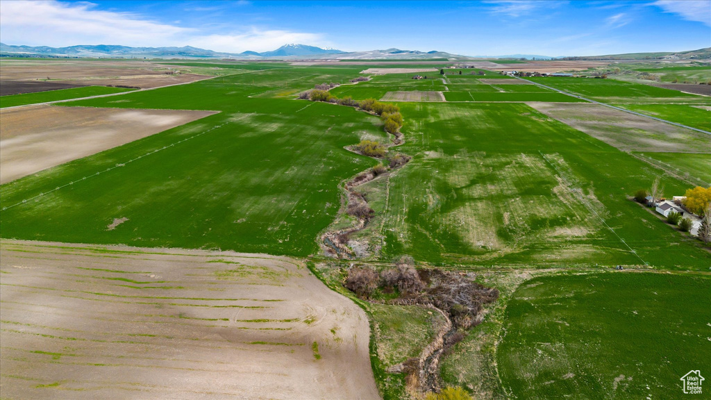 Drone / aerial view with a mountain view and a rural view