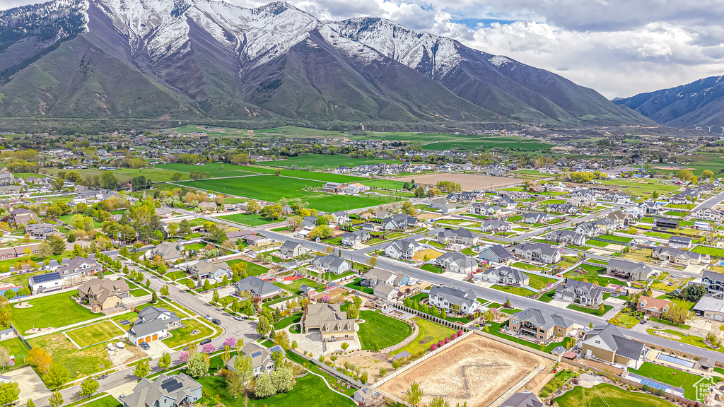 Birds eye view of property with a mountain view