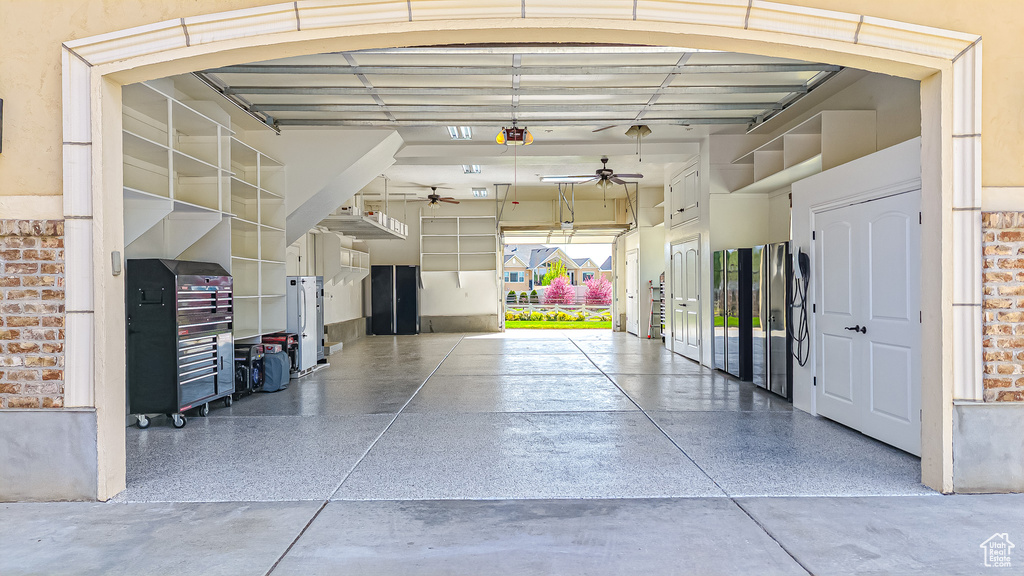 Garage featuring ceiling fan