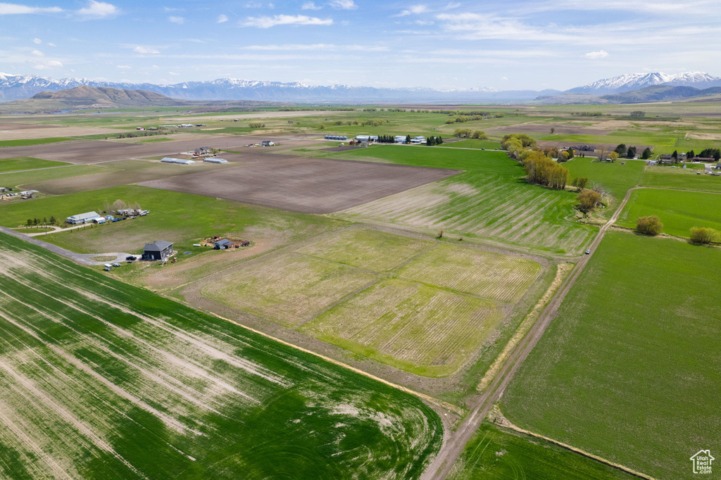 Birds eye view of property with a mountain view and a rural view