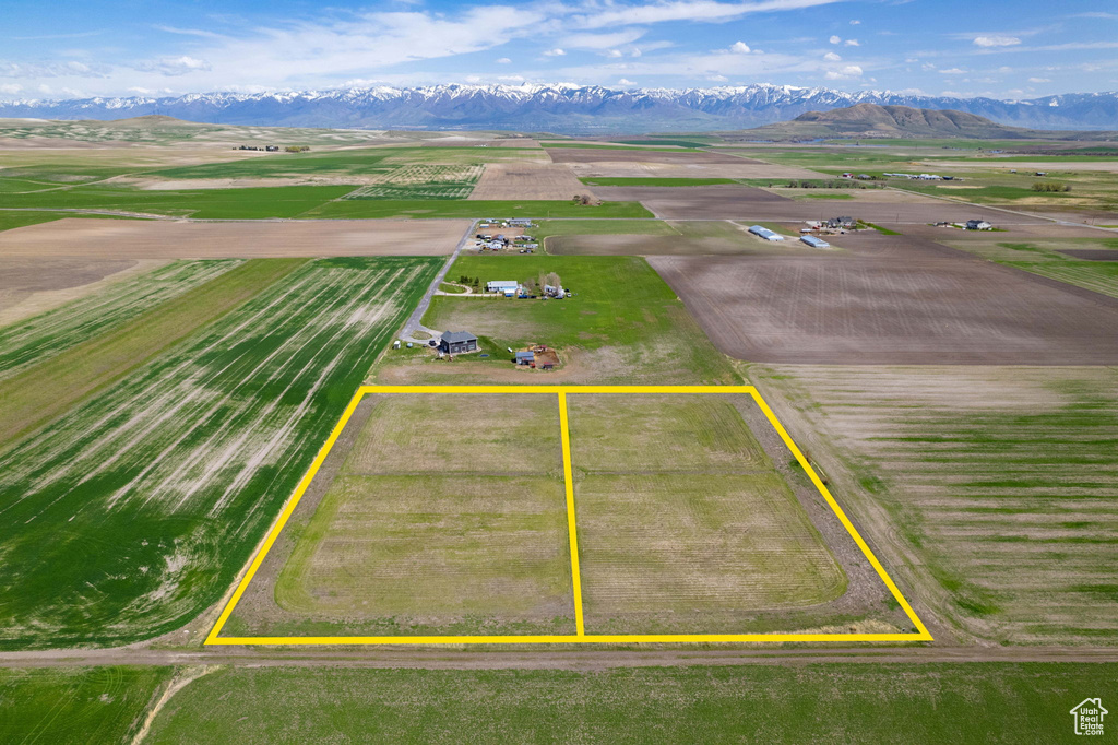 Birds eye view of property featuring a mountain view and a rural view