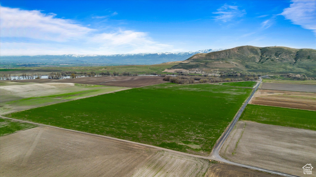 Property view of mountains featuring a water view