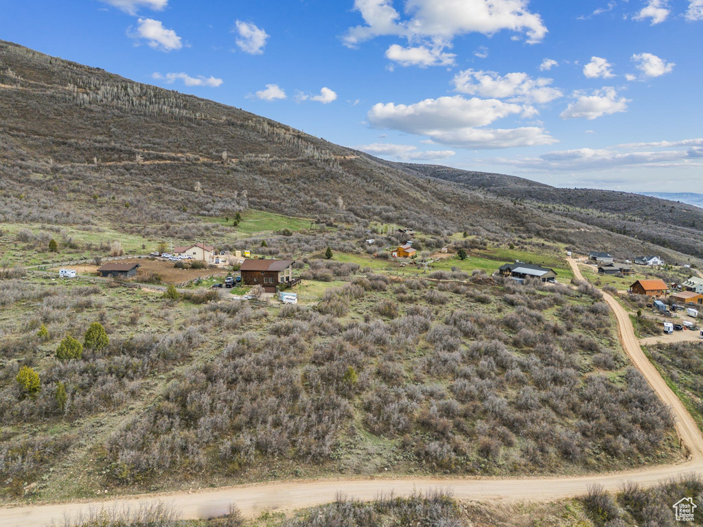 Birds eye view of property featuring a mountain view