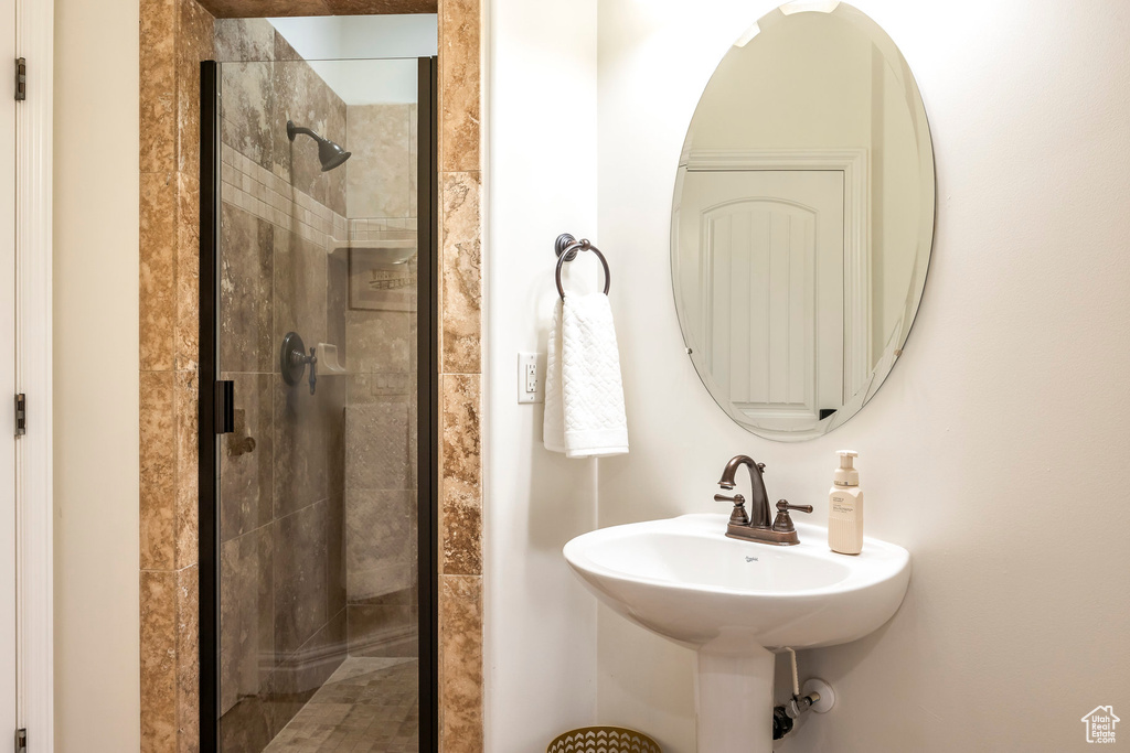 Full bathroom with a stall shower