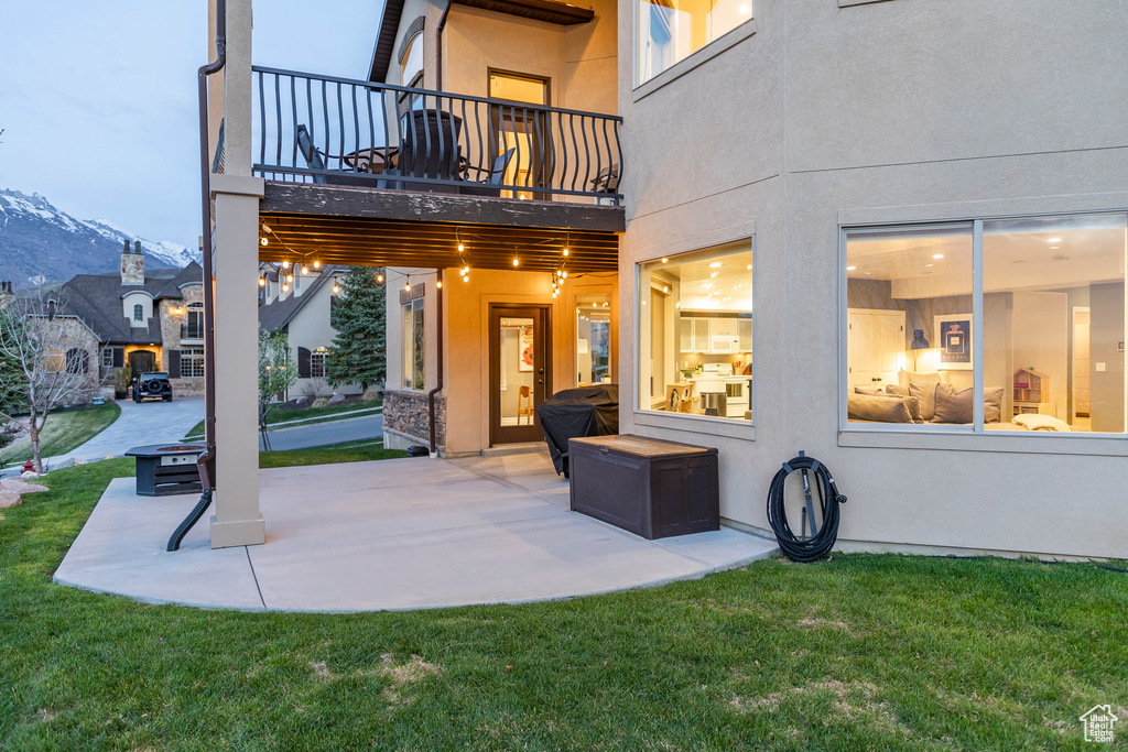 View of patio with a mountain view