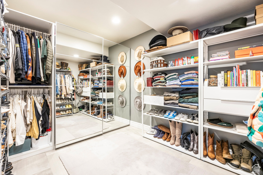 Walk in closet featuring tile patterned floors