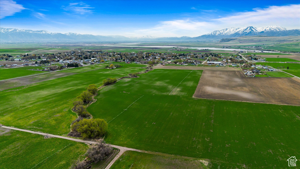 Birds eye view of property with a mountain view