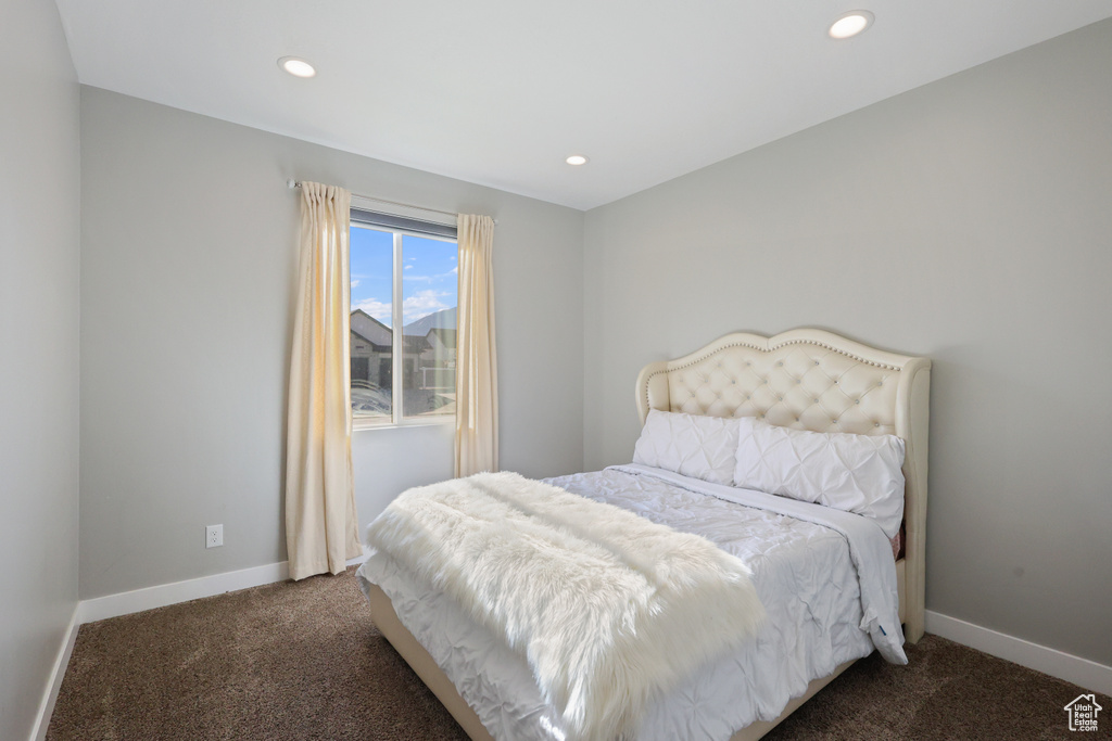 Bedroom featuring recessed lighting, baseboards, and carpet