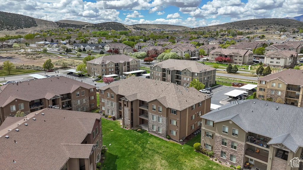 Birds eye view of property featuring a residential view and a mountain view
