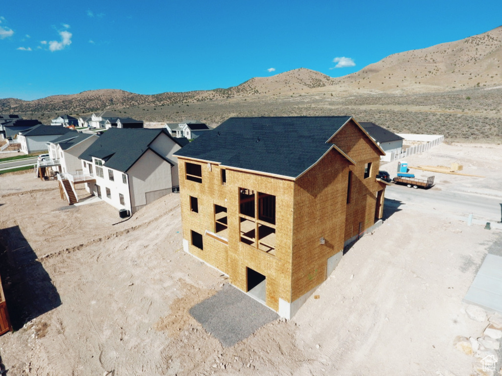 Birds eye view of property featuring a mountain view