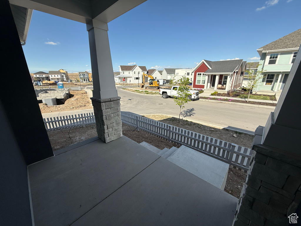 View of patio / terrace with a porch and a residential view