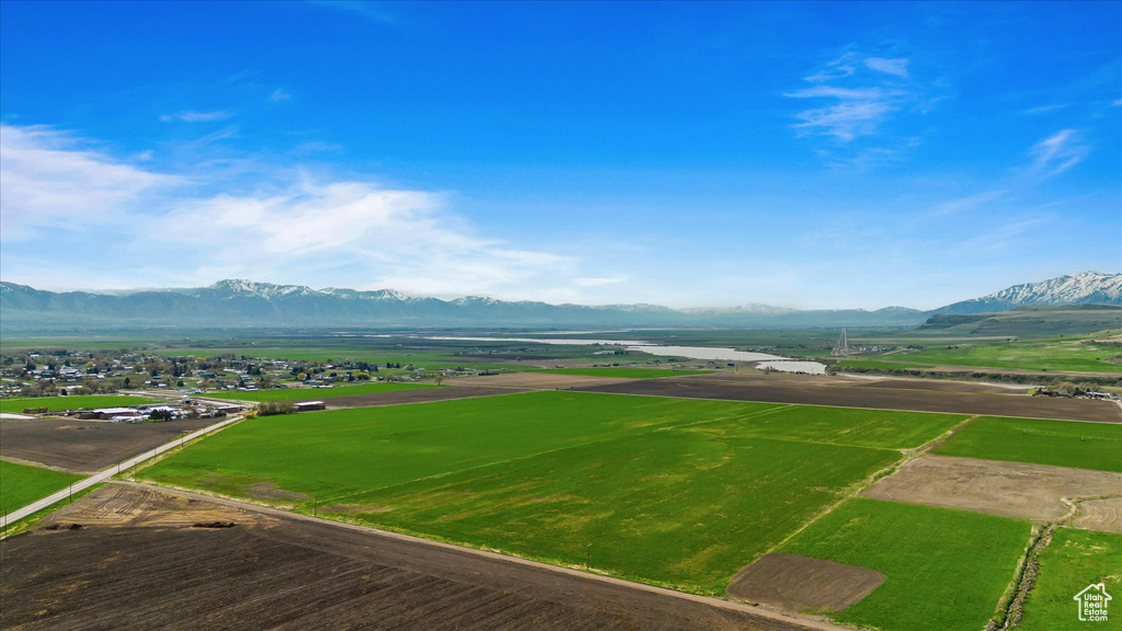 Birds eye view of property with a mountain view
