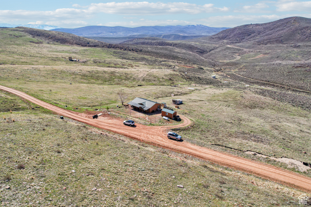 Birds eye view of property featuring a mountain view and a rural view