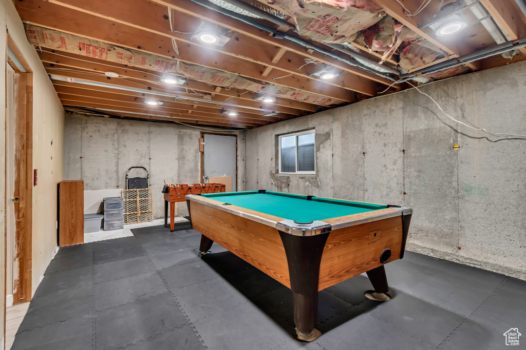 Recreation room featuring concrete flooring and pool table