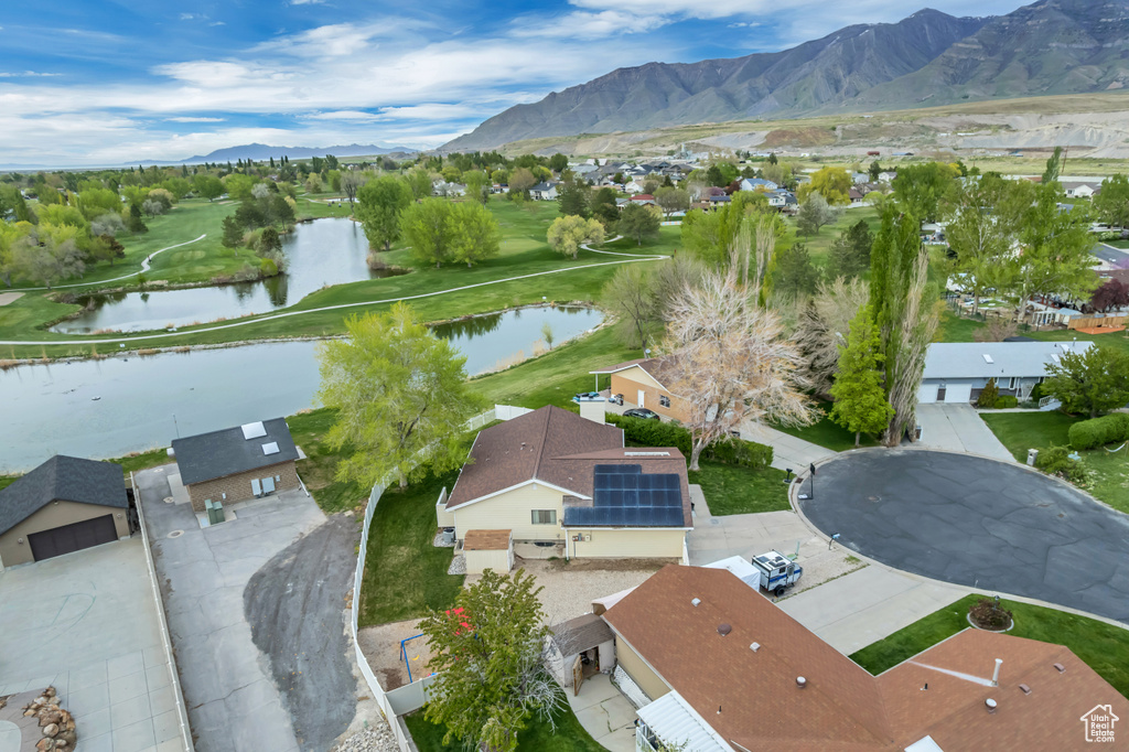 Birds eye view of property featuring a residential view and a water and mountain view