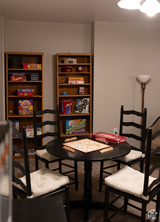 Dining area with carpet flooring