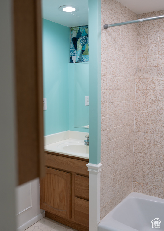 Full bathroom with vanity