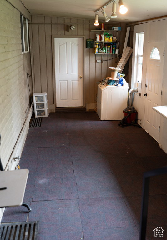 Laundry room featuring washer / clothes dryer and laundry area