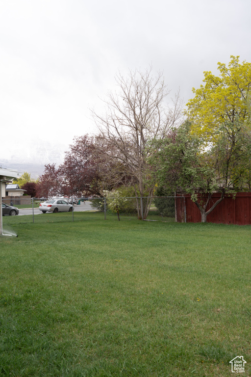 View of yard with fence