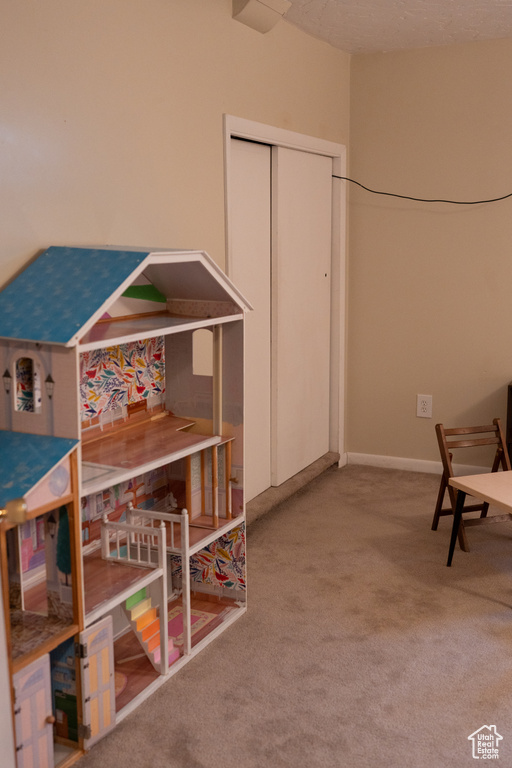 Interior space with baseboards and a closet