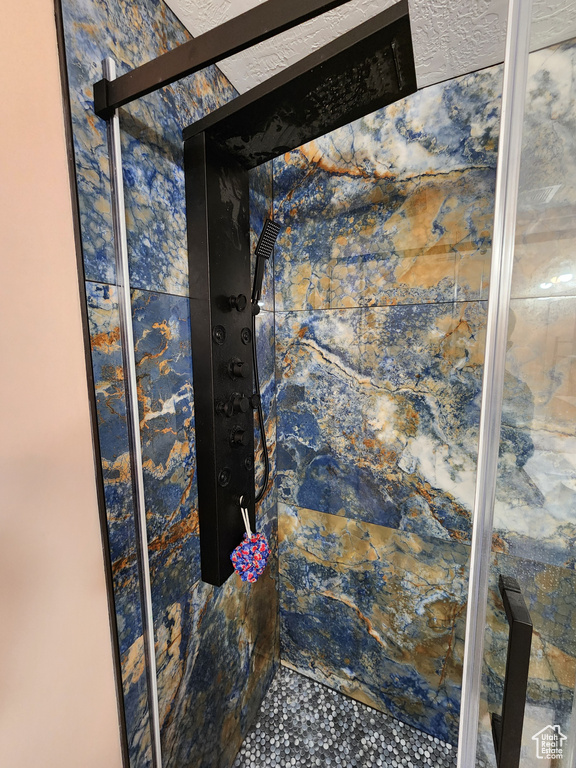 Interior details with a tile shower