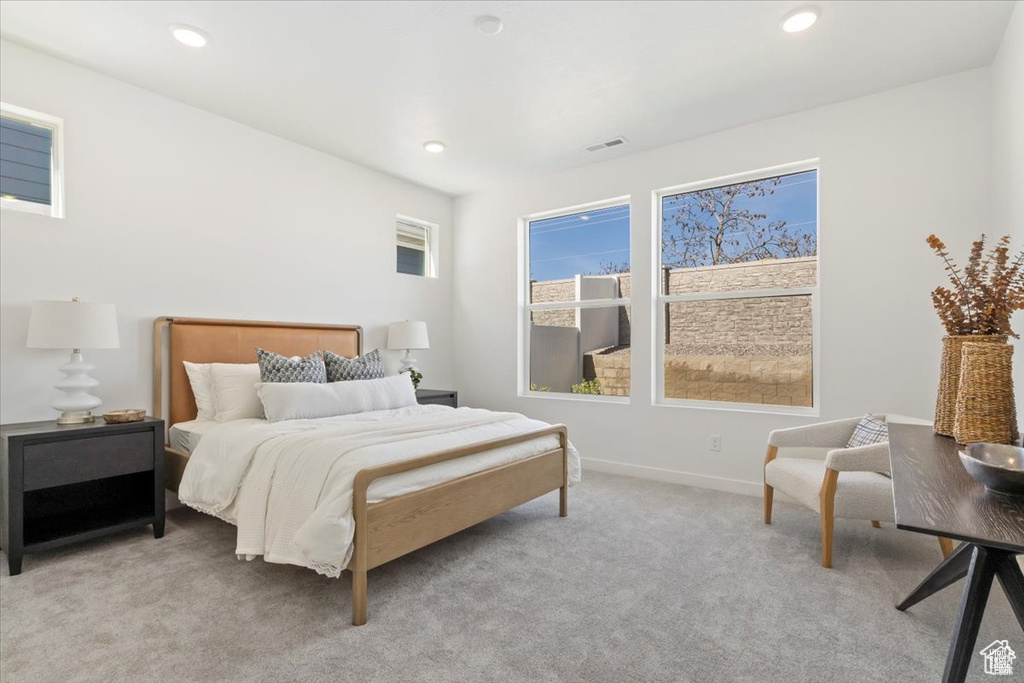 Bedroom with recessed lighting, baseboards, and light colored carpet