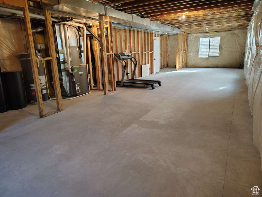 Basement with heating unit and gas water heater