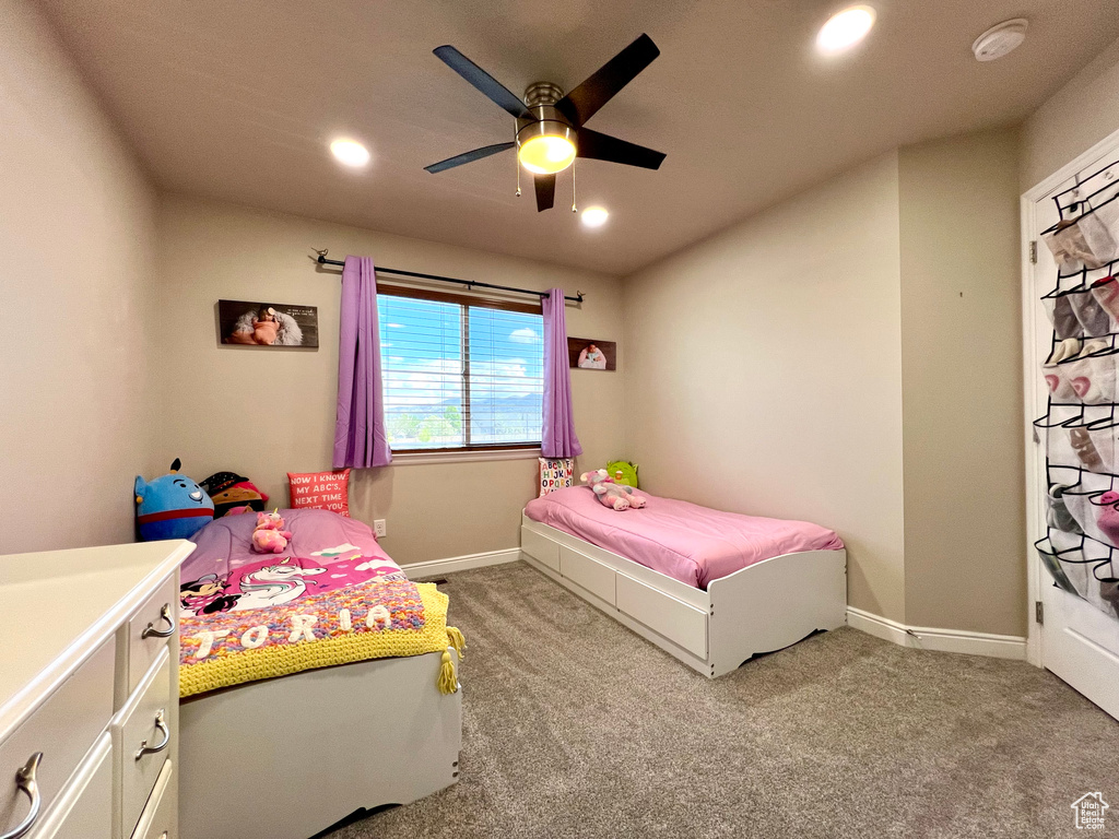 Bedroom with baseboards, light carpet, a ceiling fan, and recessed lighting