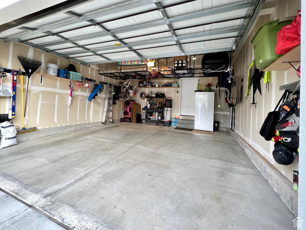 Garage with refrigerator